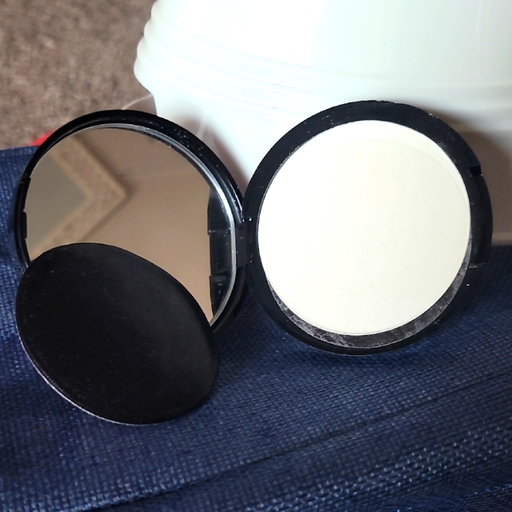Compact Mirror with White Powder